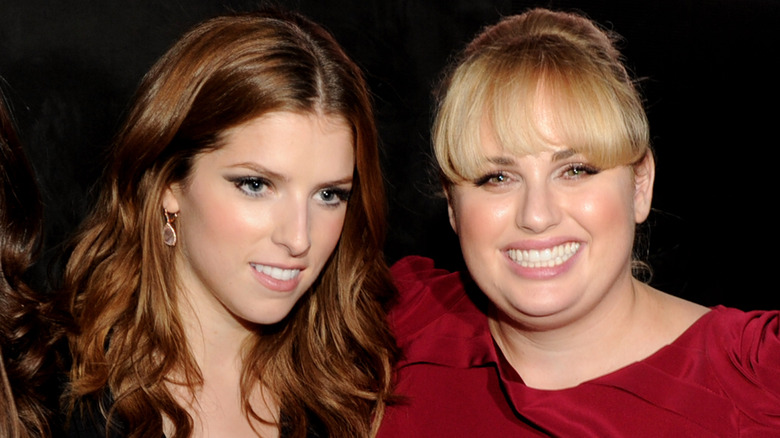 Anna Kendrick and Rebel Wilson smiling 