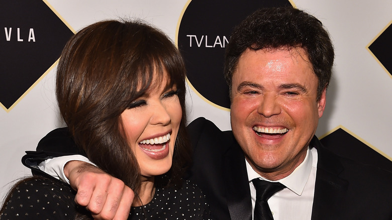 Donny and Marie Osmond laughing