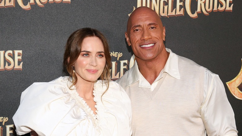 Emily Blunt and Dwayne Johnson pose side by side