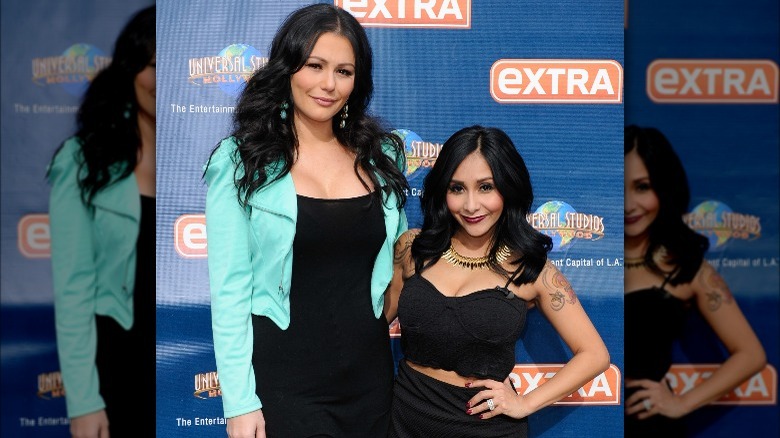 Nicole Polizzi with arm around Jenni Farley