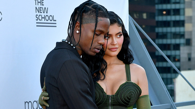 Travis Scott and Kylie Jenner posing