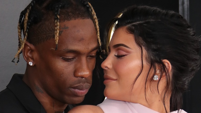 Travis Scott and Kylie Jenner posing on the red carpet