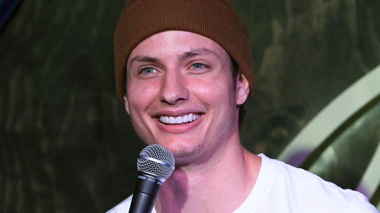 Matt Rife smiling with microphone