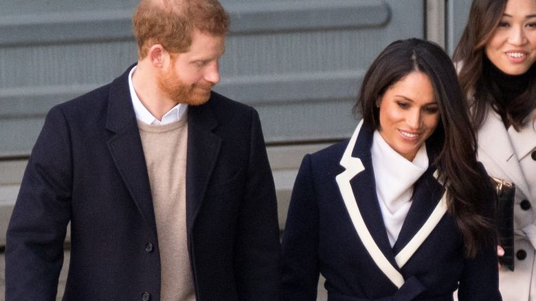 Prince Harry and Meghan Markle walking