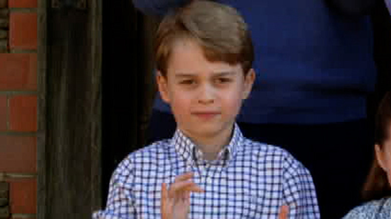 Prince George clapping