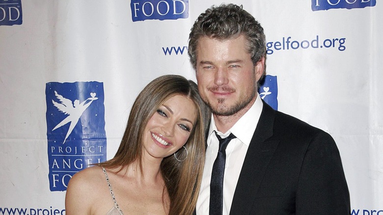 Rebecca Gayheart leaning on Eric Dane's shoulder