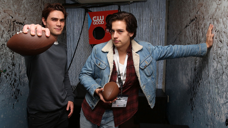 KJ Apa and Cole Sprouse posing