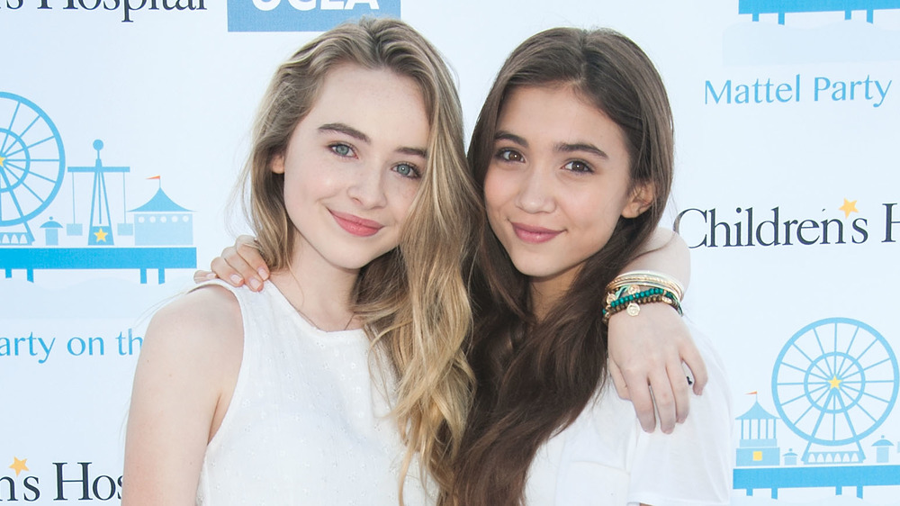 Sabrina Carpenter and Rowan Blanchard smiling