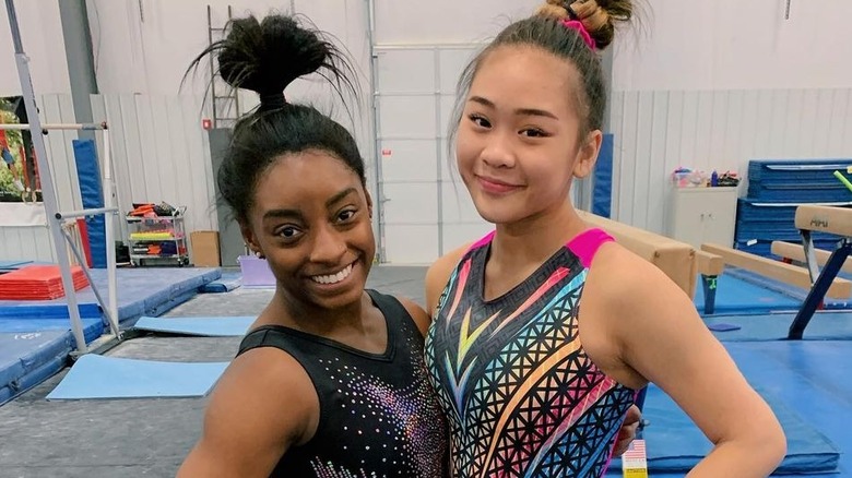 Simone Biles and Suni Lee gym