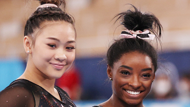 Suni Lee and Simone Biles competition