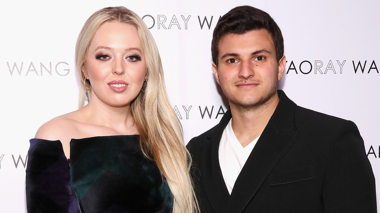 Tiffany Trump and Michael Boulos posing