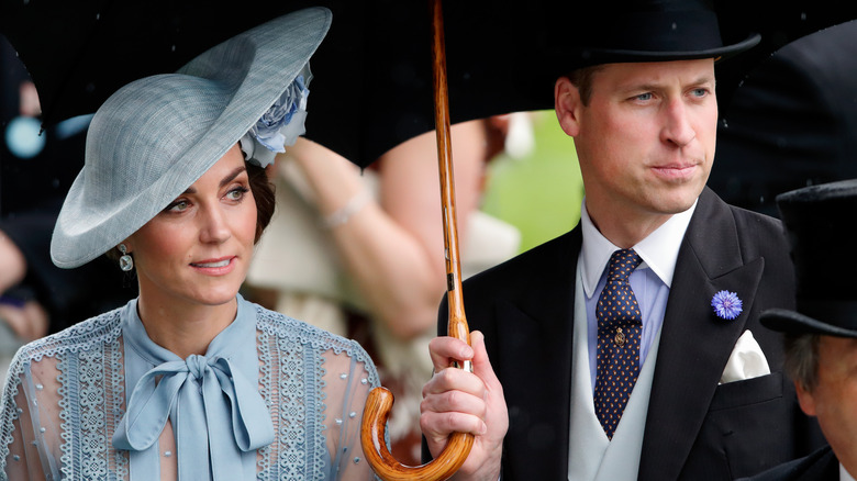 Kate Middleton and Prince William wearing hats