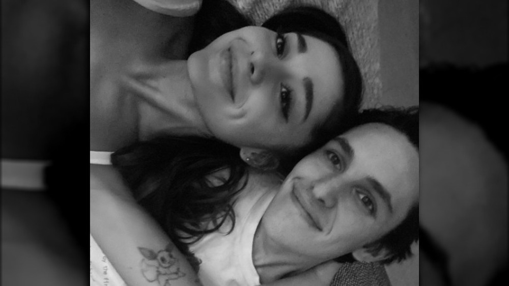 Ariana Grande and fiance Dalton Gomez smiling in selfie