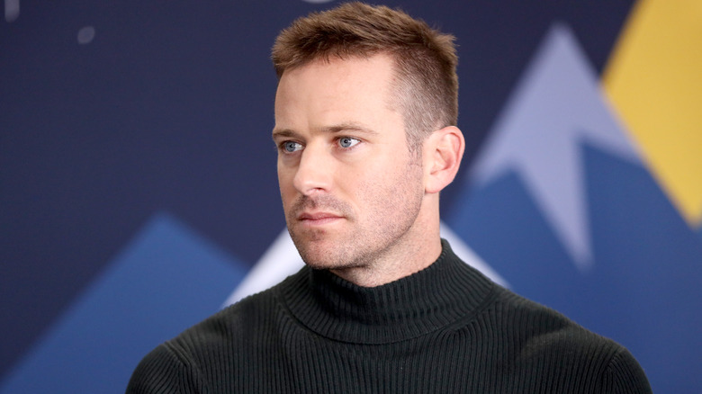 Armie Hammer looking to the side