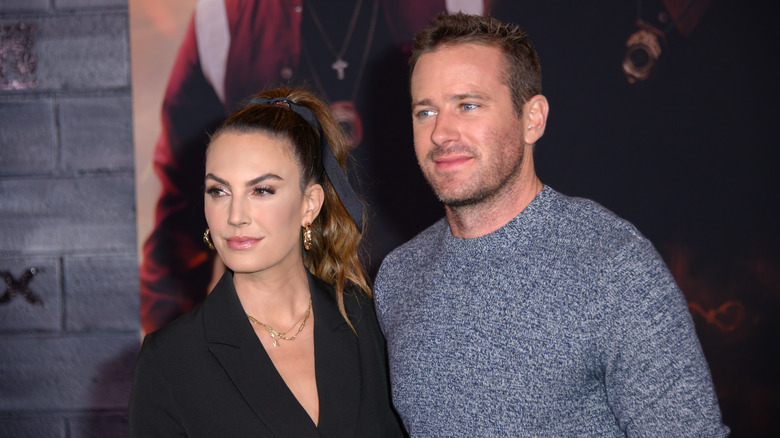 Armie Hammer, Elizabeth Chambers posing