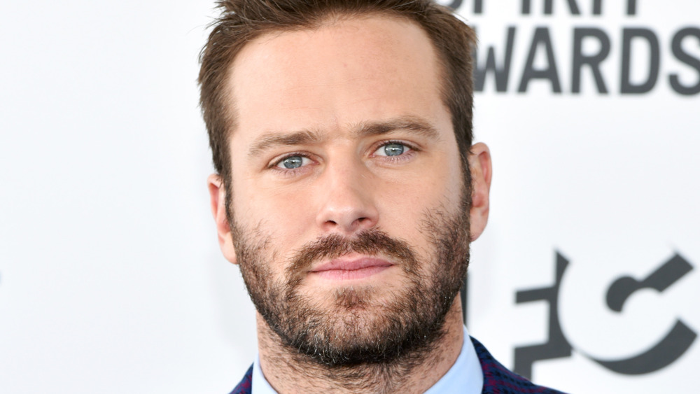 Armie Hammer staring