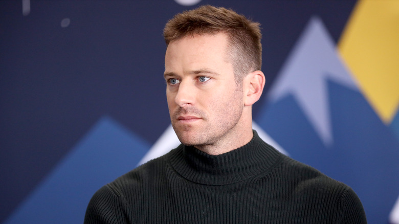 Armie Hammer wearing a black turtleneck