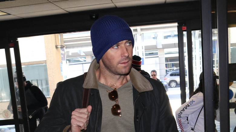 Armie Hammer in blue beanie