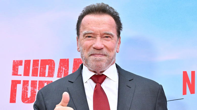 Arnold Schwarzenegger giving thumbs up at 