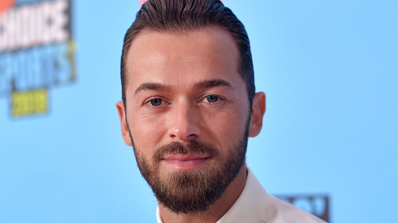 Artem Chigvintsev smiling