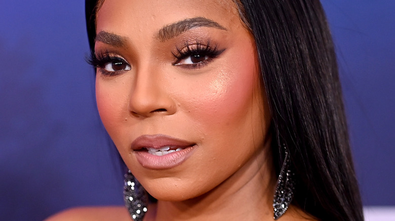 Ashanti strikes a serious pose