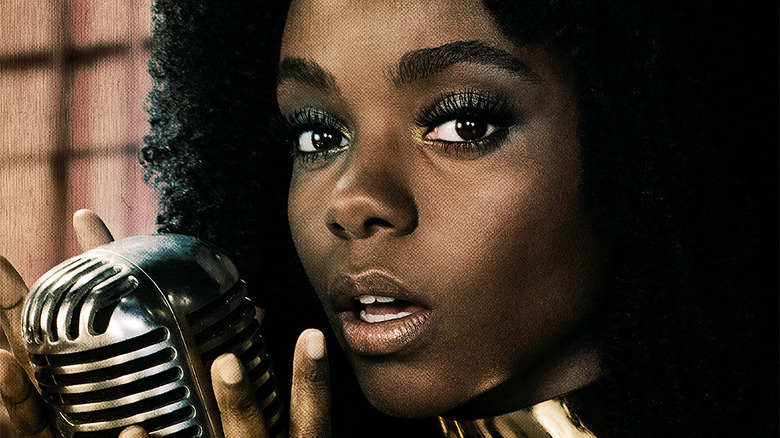 Ashleigh Murray with microphone