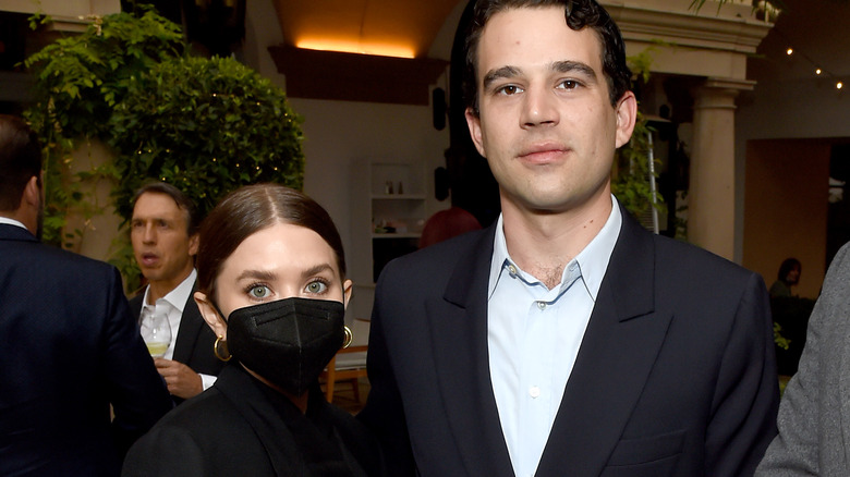 Ashley Olsen and Louis Eisner posing