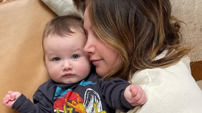 Ashley Tisdale snuggling daughter Jupiter