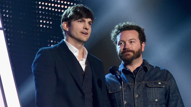 Ashton Kutcher and Danny Masterson onstage