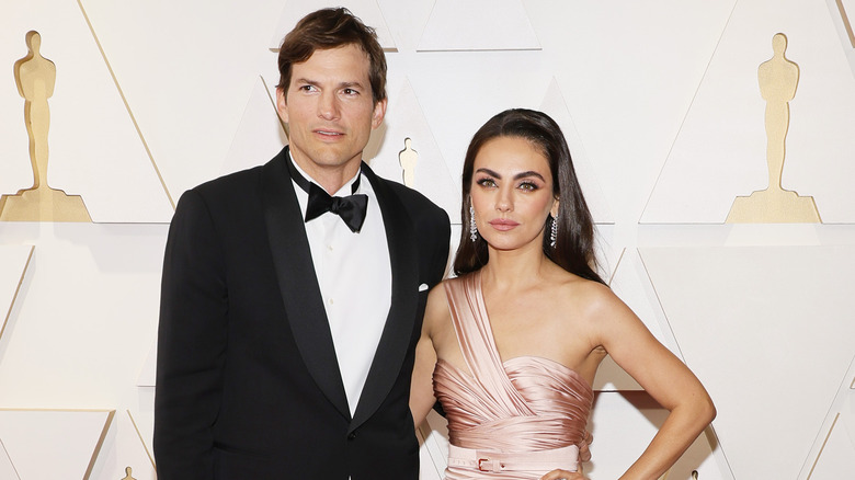 Ashton Kutcher and Mila Kunis pose on red carpet