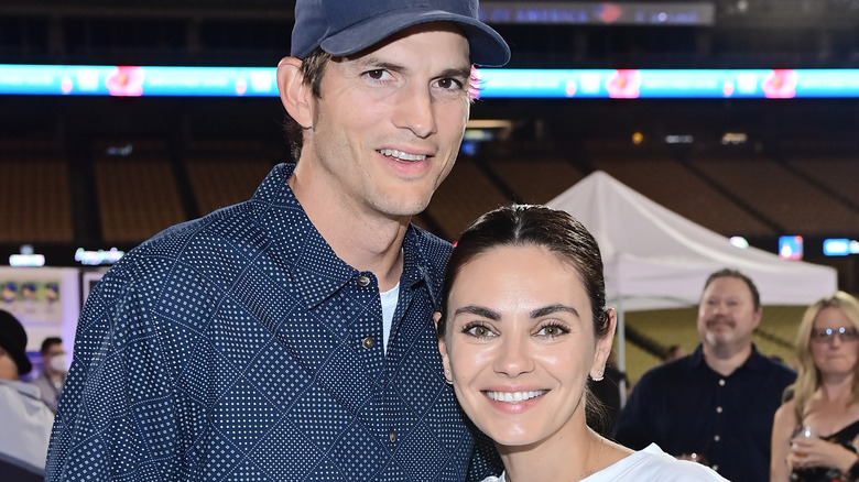 Ashton Kutcher and Mila Kunis smiling together