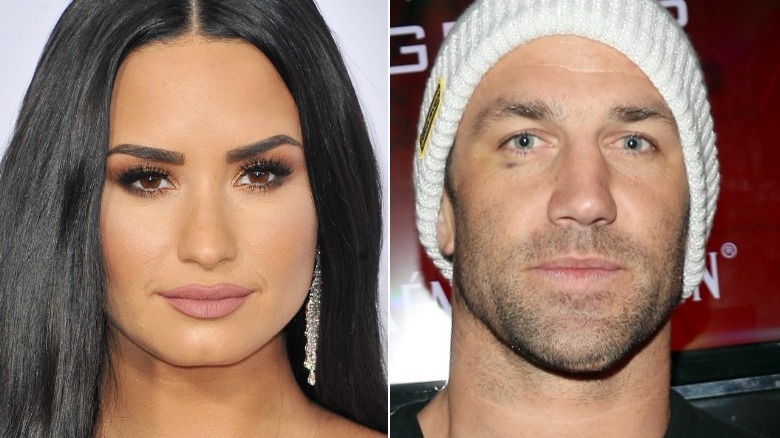 Demi Lovato, Luke Rockhold posing