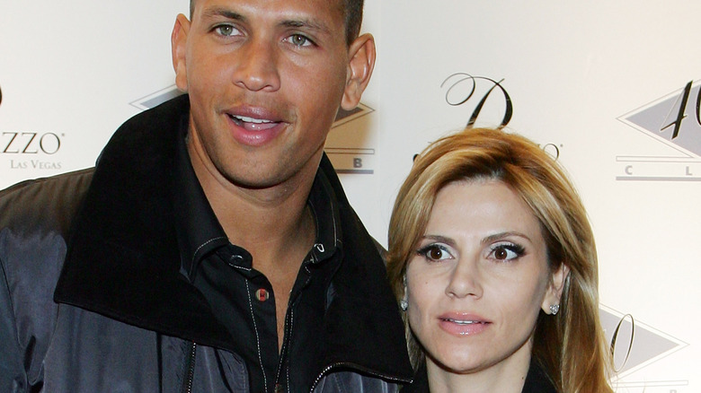 Alex Rodriguez and Cynthia Scurtis at an event