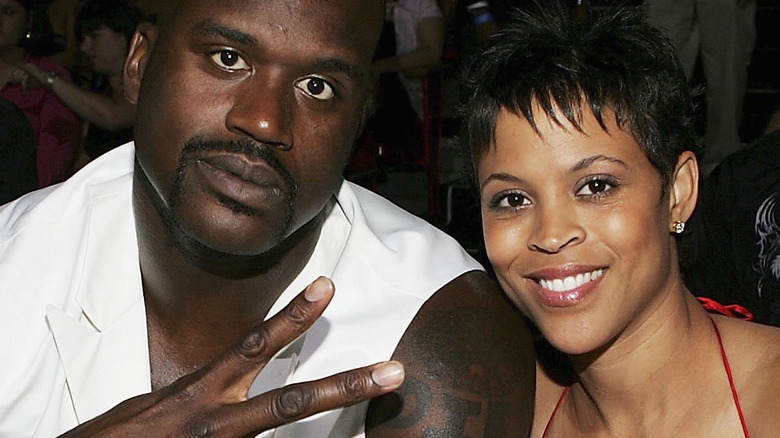 Shaquille O'Neal and Shaunie Henderson posing