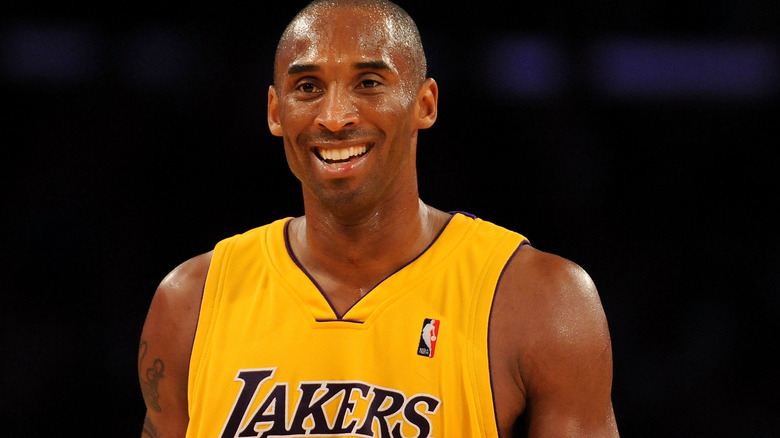 Kobe Bryant smiling in Lakers jersey