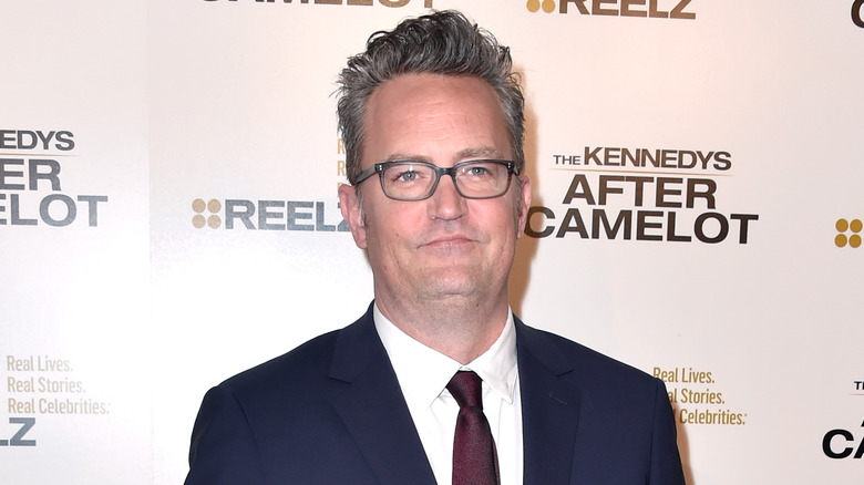 Matthew Perry wearing glasses