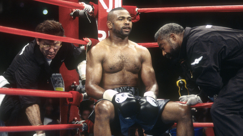 Roy Jones Jr. sitting in boxing ring