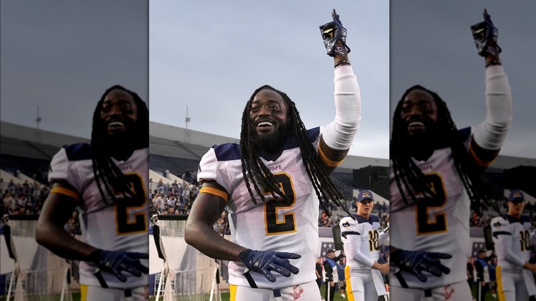 Alex Collins celebrating on the field