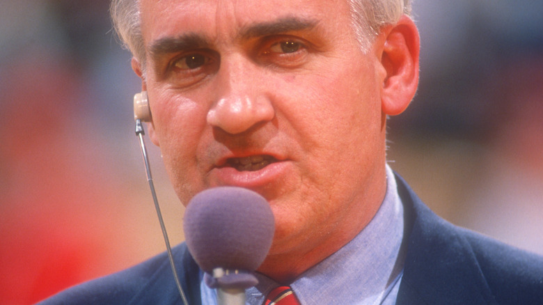 Billy Packer in College Park, Maryland in 1989 with microphone
