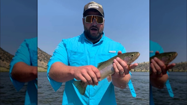 Matt Ulrich, holding fish