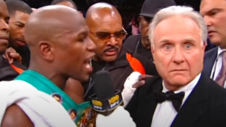 Floyd Mayweather Jr. and Larry Merchant in ring