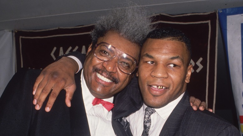 Don King and Mike Tyson posing