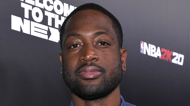 Dwyane Wade at an event, posing