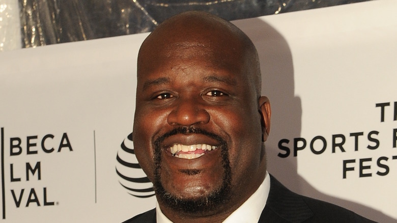 Shaquille O'Neal at an event, smiling