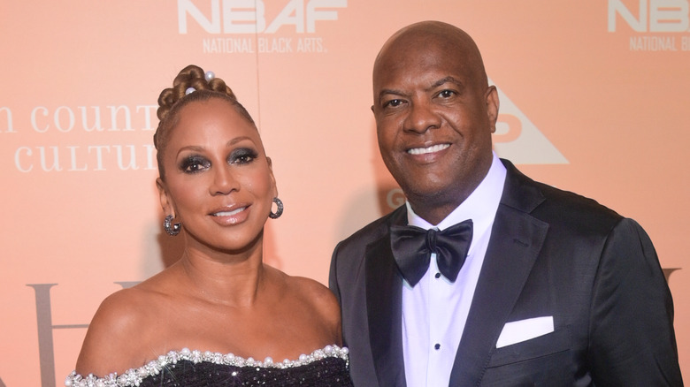 Holly Robinson Peete and Rodney Peete smiling