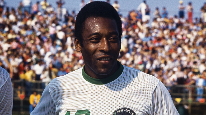 Pelé smiling at a soccer game