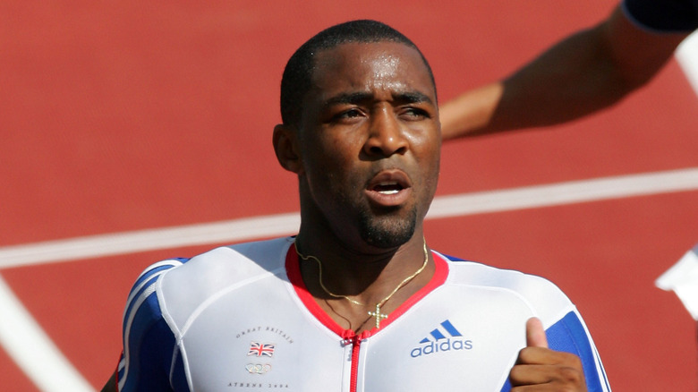 British sprinter Darren Campbell in a race during the 2004 Olympic Games in Athens