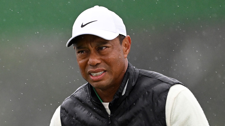 Tiger Woods with a pained expression