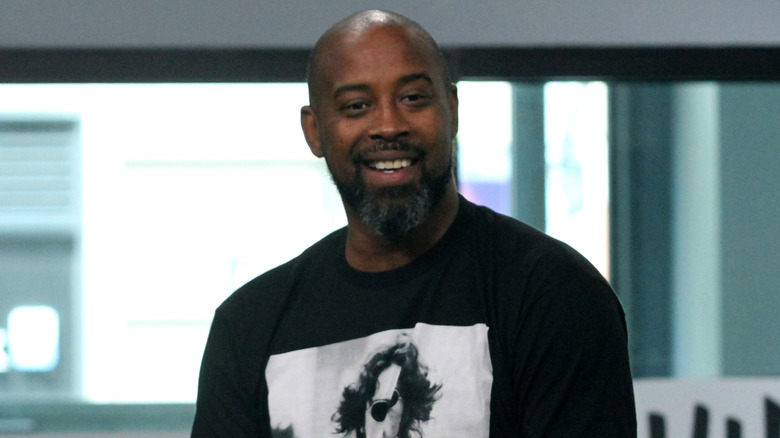 Kenny Anderson sitting at an appearance