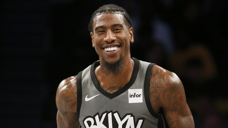 Iman Shumpert smiling while playing